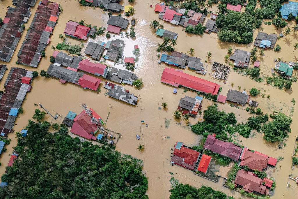 Ilustrasi perubahan iklim yang menyebabkan banjir rob semakin sering terjadi.